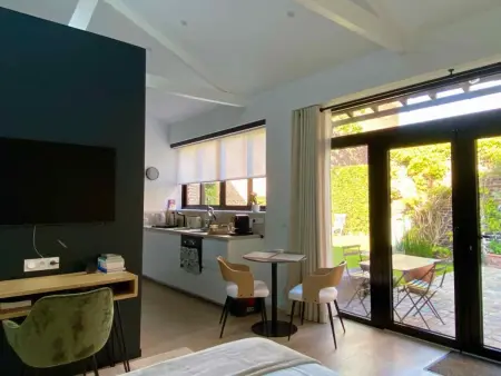 Location appartement à Saint André lez Lille, Gîte studio tout confort avec WiFi, climatisation et parking sécurisé près de Lille