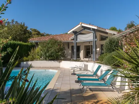 Villa 8 pers., piscine chauffée et golf à Biscarrosse : photo 3