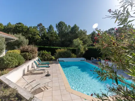 Villa 8 pers., piscine chauffée et golf à Biscarrosse : photo 7