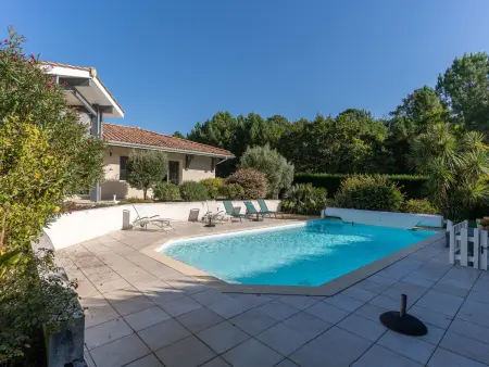 Villa 8 pers., piscine chauffée et golf à Biscarrosse : photo 8
