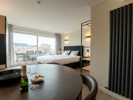 Location appartement à Blankenberge, White Mountains Retreats with city view