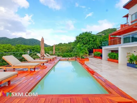 Location appartement à Saint Martin , Élégance Tropicale avec Vue Mer et Piscine à Anse Marcel