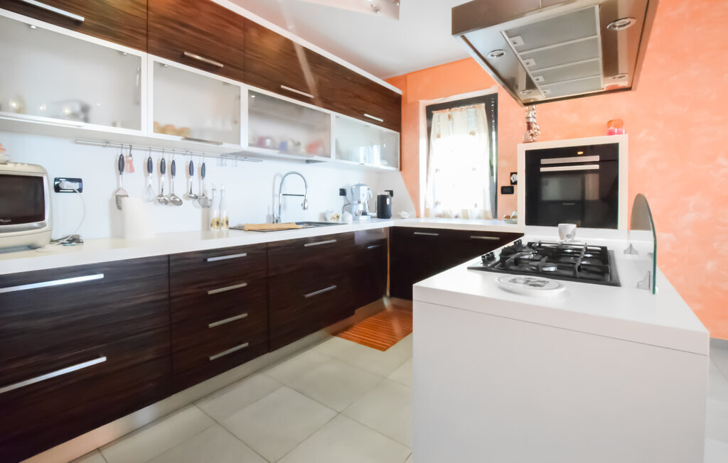 Maison 200m² avec jardin privé à Villa Celiera - Photo 8