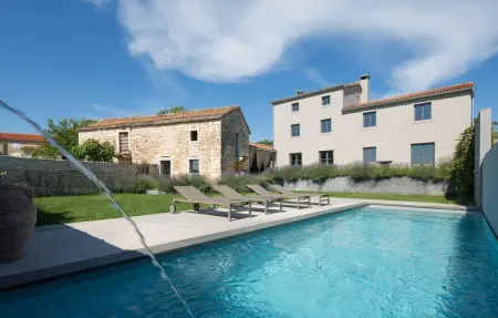 Location maison à Tinjan