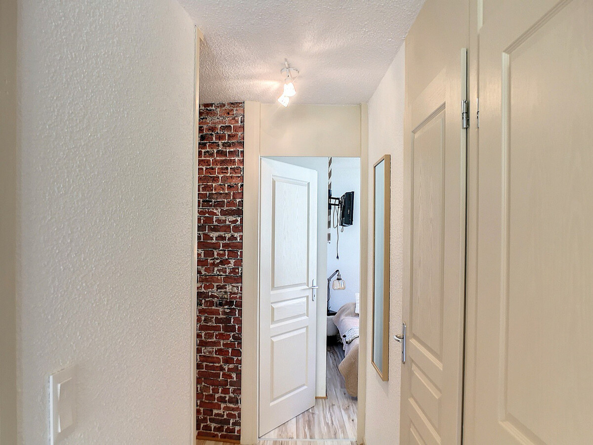 Appartement rénové 40m² Les Menuires, balcon vue piste - Photo 5