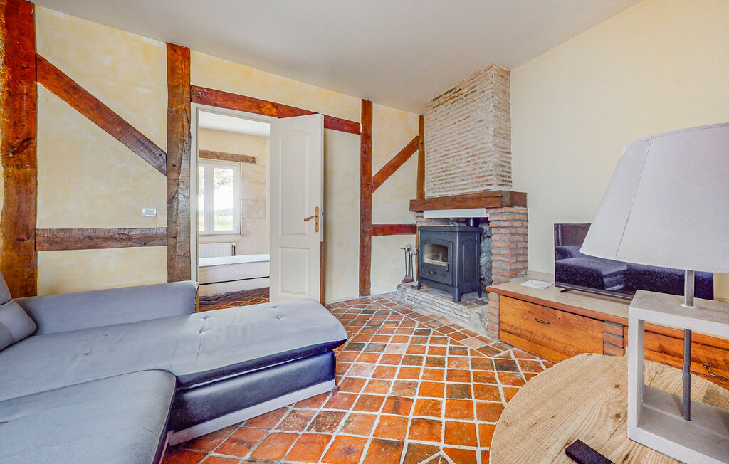 Maison de vacances au cœur du village, poutres et cheminée - Photo 5
