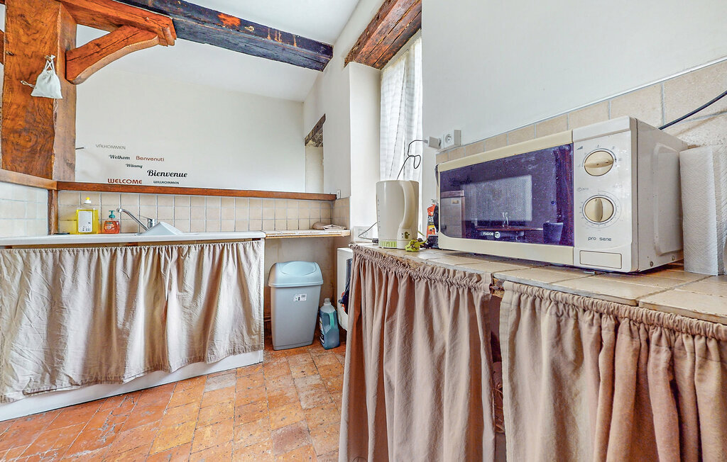 Maison de vacances au cœur du village, poutres et cheminée - Photo 7