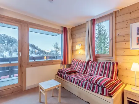 Location appartement à La Plagne Tarentaise, Appartement confortable avec balcon ensoleillé et parking couvert