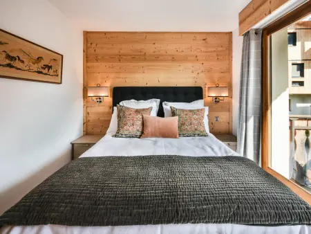 T2 aux Gets avec 2 balcons, pistes à 100 m et parking : photo 7