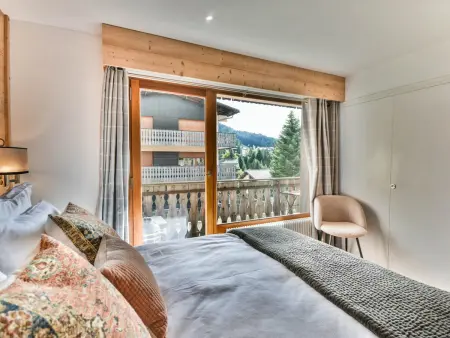 T2 aux Gets avec 2 balcons, pistes à 100 m et parking : photo 8