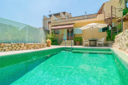 Villa Es Raco à Caimari : piscine et terrasses : photo 3