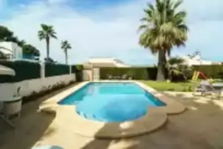 Villa Gladiolo à Xàbia : piscine et jardin spacieux : photo 8