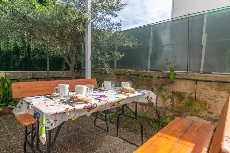 Villa Luna à Puerto De Alcudia : piscine et jardin - Photo 12