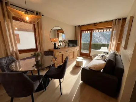 Location appartement à La Clusaz, T2 design et cosy à La Clusaz avec terrasse sud et garage privé