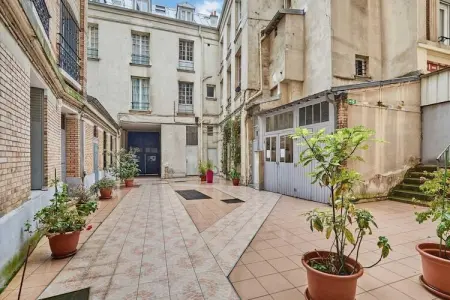 Location appartement à Paris, Appartement de charme au centre de Paris par Studio Prestige