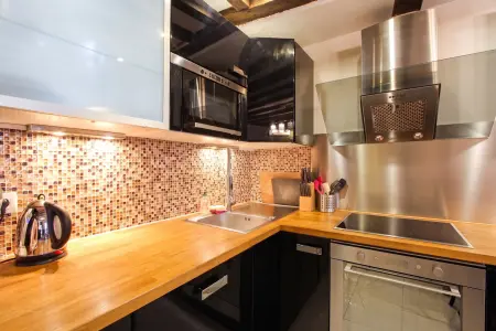 Appartement 75 m² vue sur la ville, 2 chambres, centre de Paris : photo 4