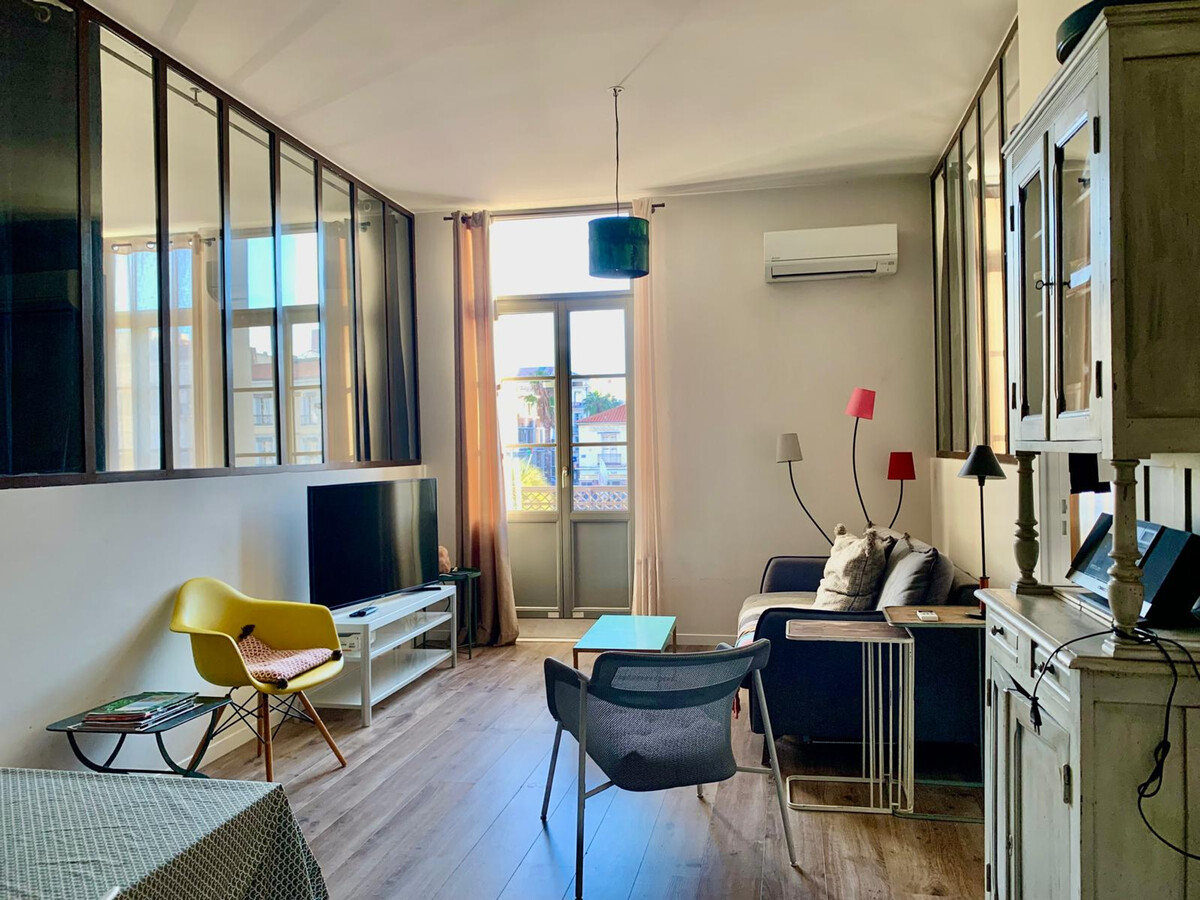 T3 rénové climatisé avec balcon sur canal à Sète - Photo 3