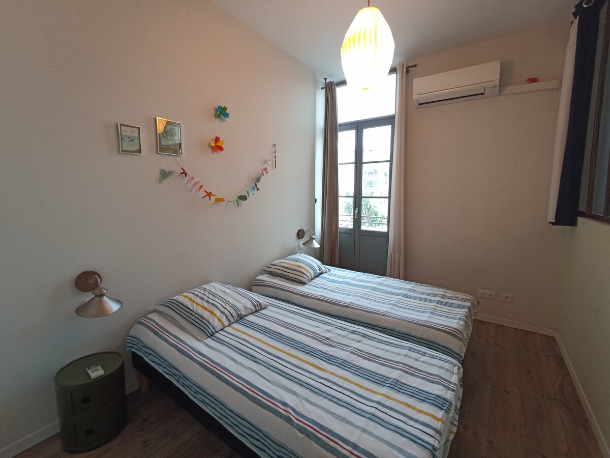 T3 rénové climatisé avec balcon sur canal à Sète - Photo 11