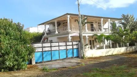 Maison vue mer à Trou aux Biches, jardin et terrasse