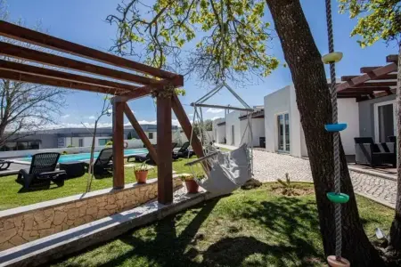 Maison avec piscine partagée et jardin clos à Atalaia, 8 pers. : photo 16