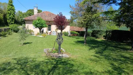 Location maison à Martisserre, Maison chaleureuse à Martisserre avec jardin privatif et cheminée