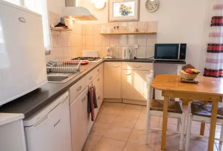Appartement avec parking privé et entrée privée à Cassen : photo 2