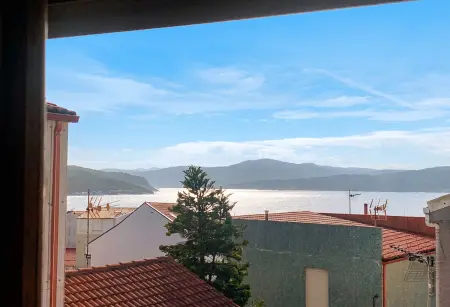Maison accueillante avec vue sur mer à Corme-Porto