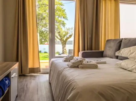 Maison Atalaia avec piscine partagée, jardin clôturé et balançoire : photo 6