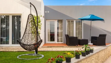 Maison Atalaia avec piscine partagée, jardin clôturé et balançoire : photo 11