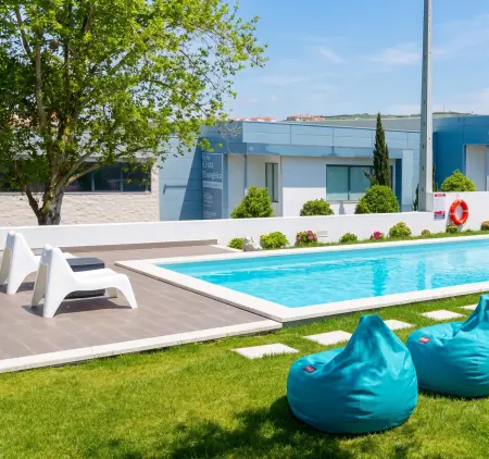 Maison Atalaia avec piscine partagée, jardin clôturé et balançoire : photo 17