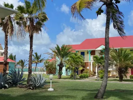 Location appartement à Saint François, Appartement moderne à Saint-François avec piscine partagée