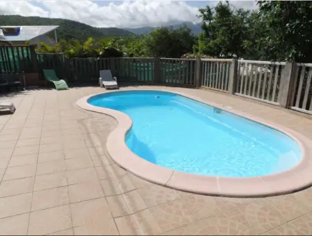 Chalet charmant à Bouillante avec piscine partagée - Photo 1