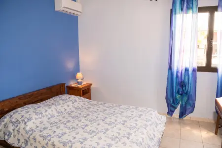 Appartement 3 chambres vue mer et montagne, jardin clos, Petite Île : photo 7