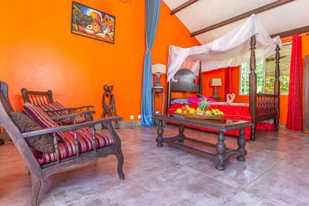 Location bungalow à Sainte Rose, Bungalow charmant avec vue sur la mer à Sainte Rose