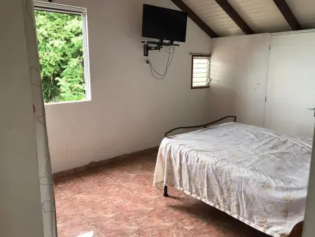 Maison avec vue mer, terrasse et jardin clos à Pointe-Noire : photo 10