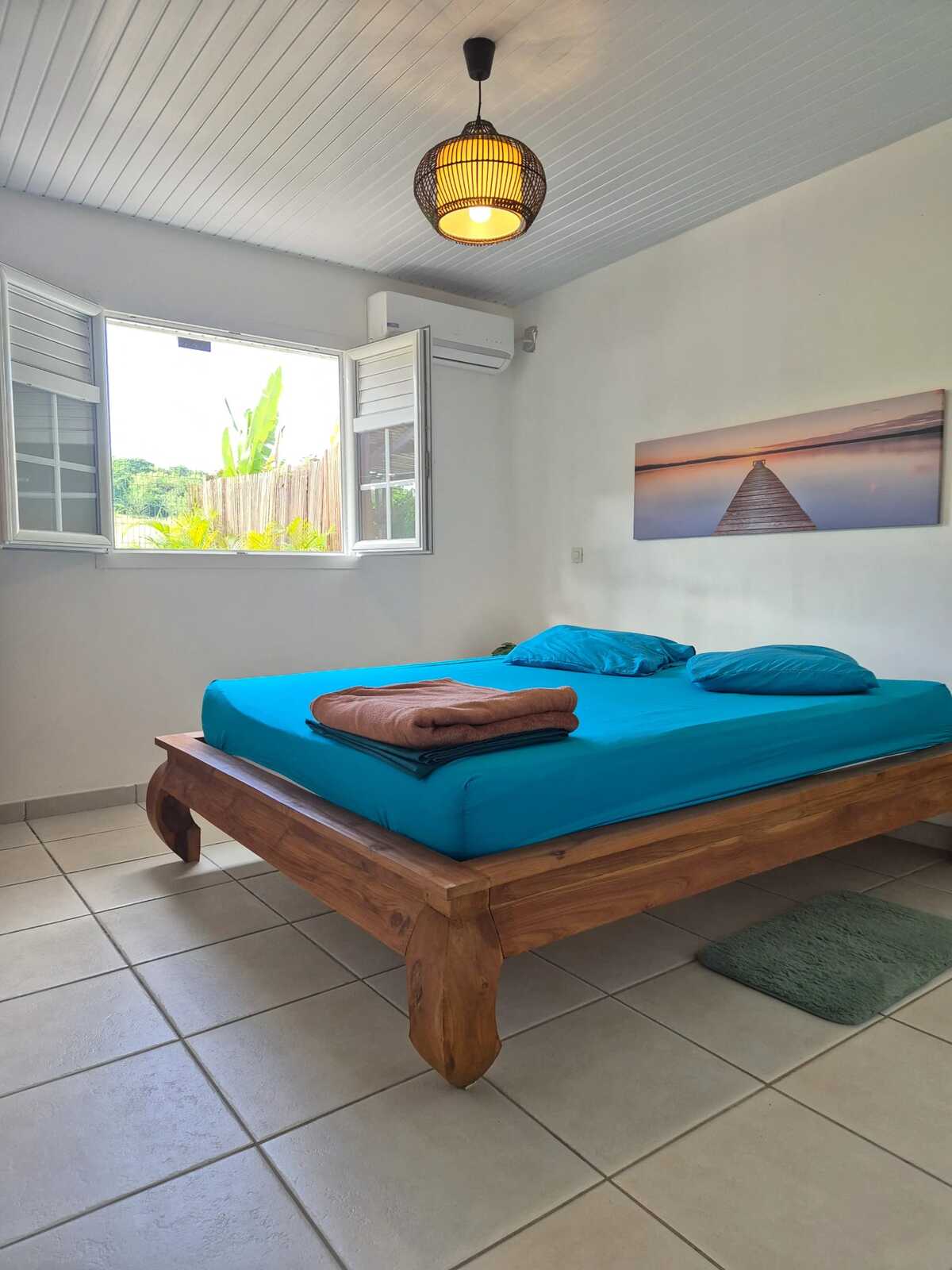 Maison 58 m² à Sainte-Anne, jardin clôturé et pergola - Photo 13