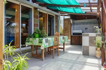 Location appartement à L'étang sale, Studio charmant à LÉtang-Salé, jardin et vues, 25 m²