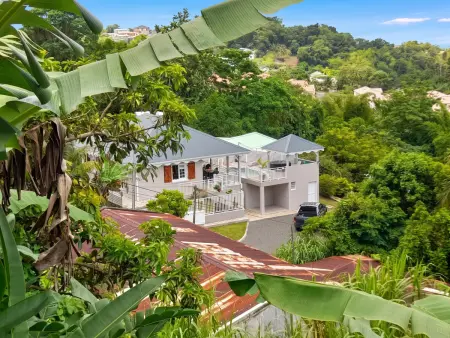 Appartement avec vue mer, jacuzzi et jardin à Gros-Morne : photo 15