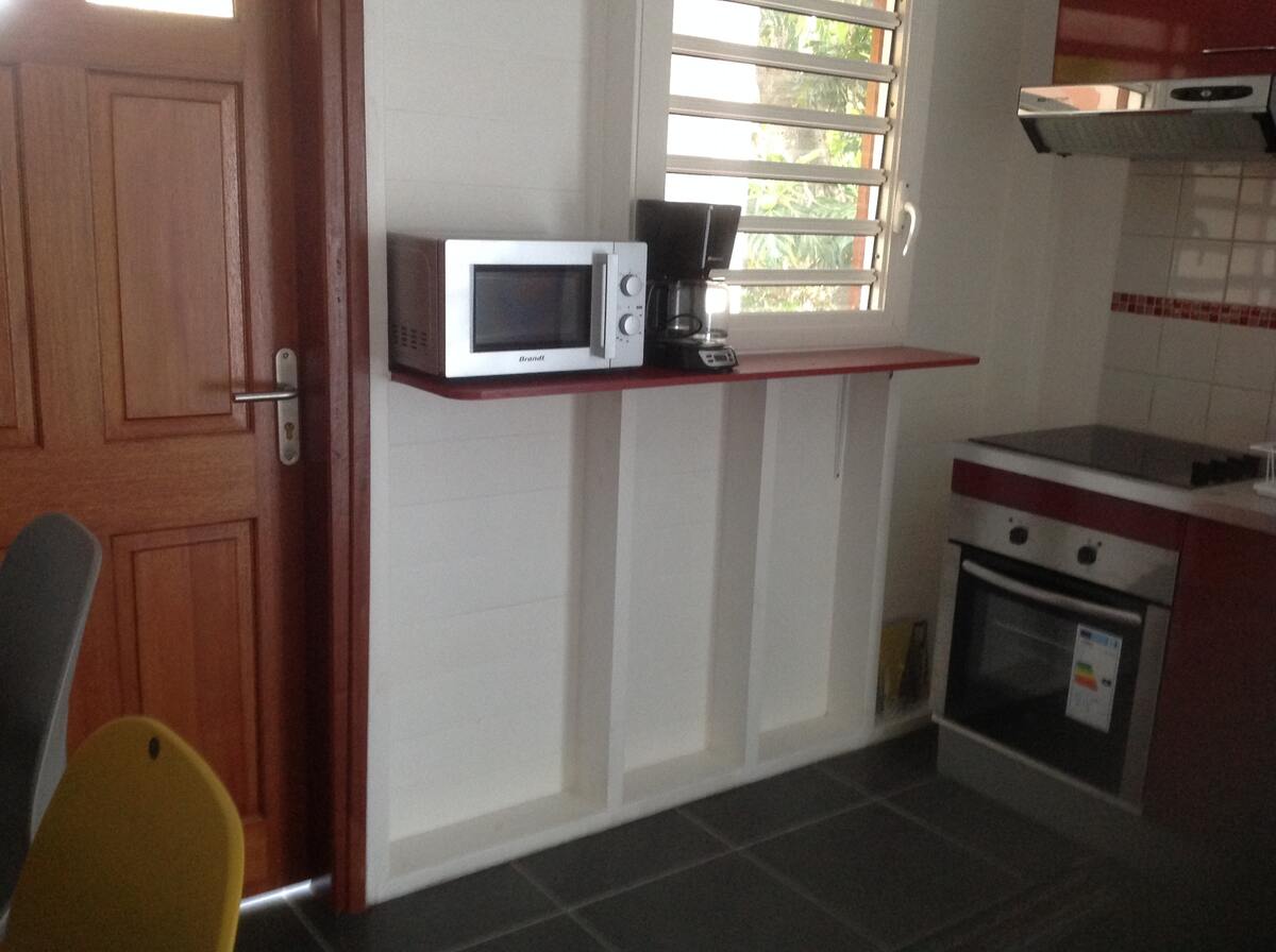 Appartement calme avec climatisation aux Abymes, balcon vue jardin - Photo 6