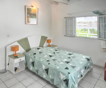 Location appartement à Le Moule, Appartement convivial au Moule avec jardin clôturé