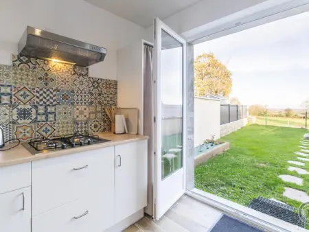 Location gite à Valcanville, Charmante maison à Valcanville avec jardin privé et wifi