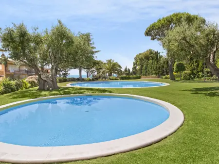 Location appartement à Calella de Palafrugell, Appartement familial avec piscine et proche de la mer à Calella de Palafrugell