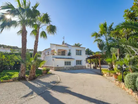 Location villa à Moraira, Villa Confortable avec Piscine Chauffée, Jardins et Proximité Plage, 12 Personnes à Moraira