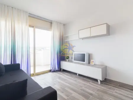 Location appartement à Salou, Appartement confortable à Salou avec piscine, climatisation et Wi-Fi