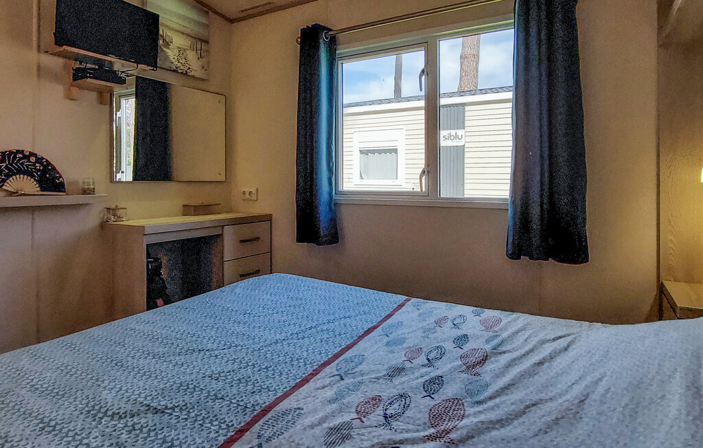 Mobil-home 2 chambres avec piscine chauffée à Saint-Julien-en-Born - Photo 18