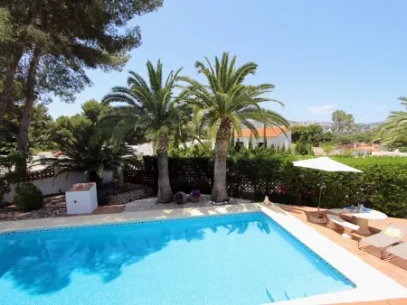 Location villa à Moravit, Charmante villa à Moraira avec piscine privée, proche plage et commodités