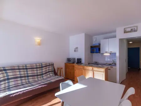 Location appartement à La Mongie, Studio cabine 4 pers, pied des pistes avec parking couvert, balcon sud, centre station