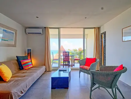 Location appartement à Saint Martin , Studio spacieux face à la mer avec climatisation