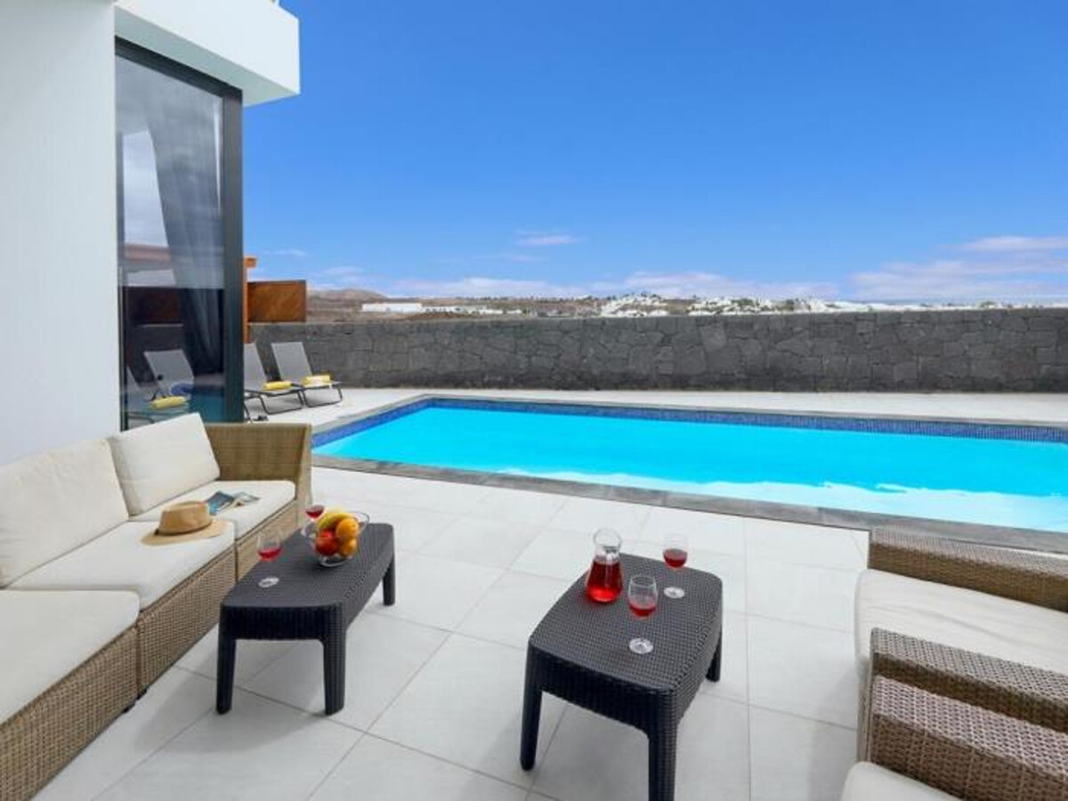 Villa Bern à Tías : 3 chambres, piscine chauffée et vue mer - Photo 3