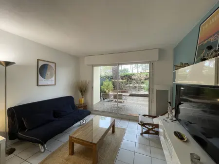 T2 avec jardinet et piscine partagée à Soustons, parking privé : photo 3
